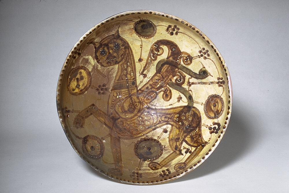 Golden tray with painted animals.