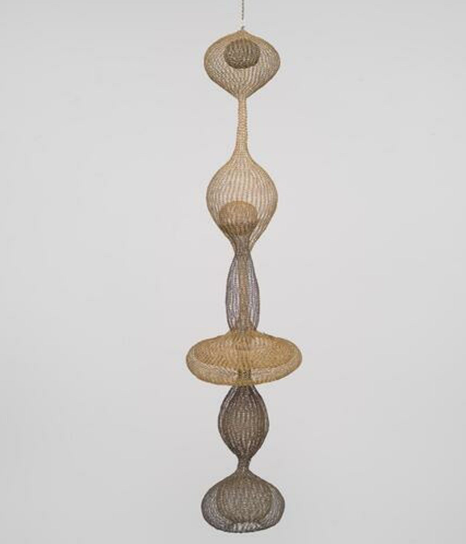 Hanging six-lobed complex interlocking continuous form.