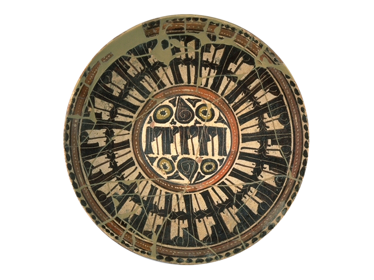 Bowl with gold and black decoration.