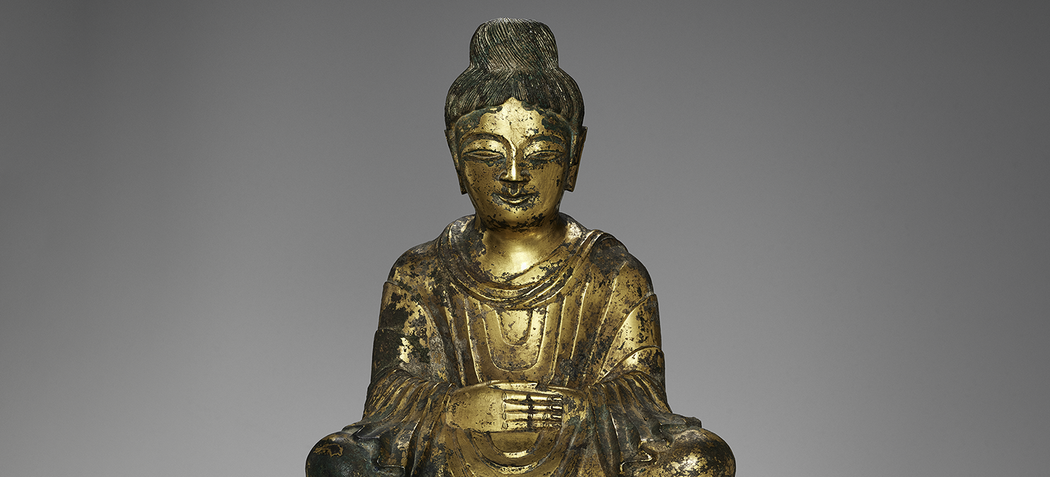 Golden seated Buddha.