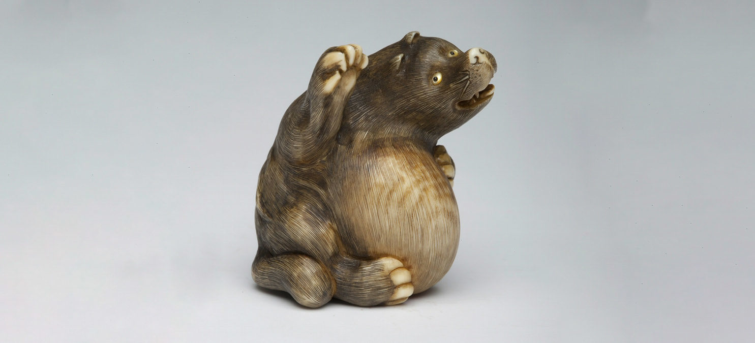Small carving of a bear.
